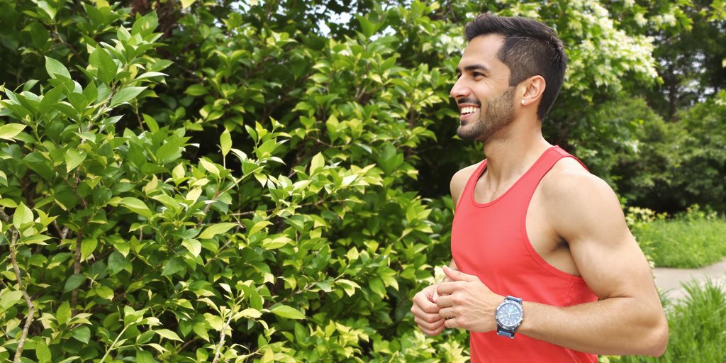Person jogging in nature for diabetes management.